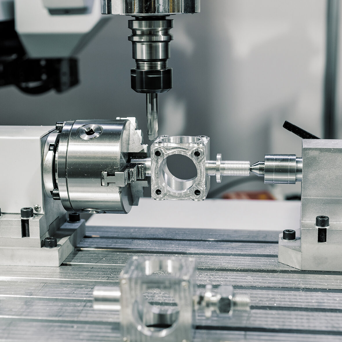 Precision milling CNC machine tool makes part. Metalworking.